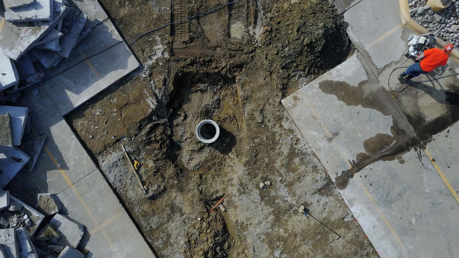 Overhead view of a storm sewer structure exposed during excavation